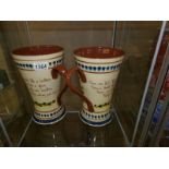 2 large twin handled motto ware vases.