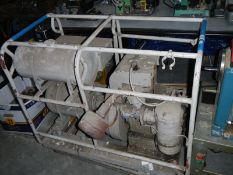 An air-cooled petrol generator, 2.75 bhp, 1800rpm, W.D.