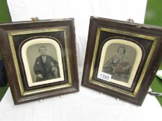 A pair of framed and glazed Victorian portrait photographs.