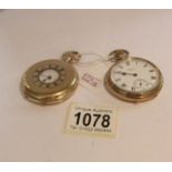 A Waltham pocket watch in yellow metal and another pocket watch also in yellow metal.