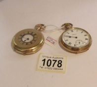 A Waltham pocket watch in yellow metal and another pocket watch also in yellow metal.