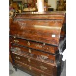 A mahogany bureau.