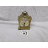 A small brass Swiza bracket clock with alarm.