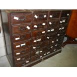 An industrial 28 drawer filing cabinet