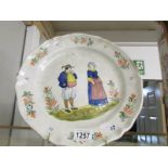 An early hand painted Delft plate, a/f.