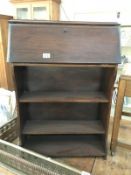 A 1930's oak bureau bookcase