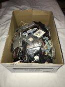 A box of bankrupt stock from a ski shop, accessories and jewellery,