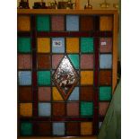 A framed Victorian lead glazed stained glass panel.