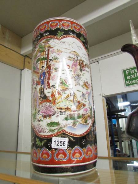 An oriental porcelain stick stand. ****Condition report**** Approximate height 45.