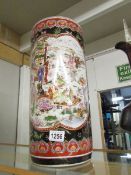 An oriental porcelain stick stand. ****Condition report**** Approximate height 45.