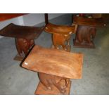 4 assorted elephant stools.