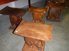 4 assorted elephant stools.