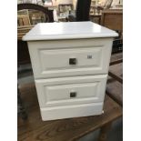 A white finished 2 drawer bedside chest