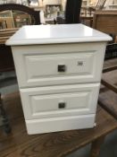 A white finished 2 drawer bedside chest