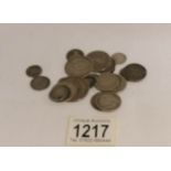 24 Victorian silver coins including 1874 half crown, approximately 97 grams.