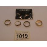 4 assorted 9ct gold rings including eternity and a pair of 9ct gold earrings featuring love heart