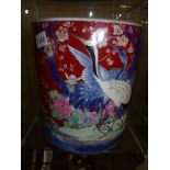 A large oriental bird decorated pot.