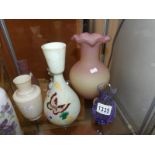 A mixed lot of coloured glass vases and a scent bottle.