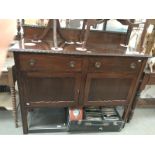 An Edwardian mahogany sideboard