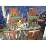 A wooden garden table and chair set (8 chairs)