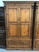 A double pine wardrobe with 2 drawers
