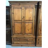 A double pine wardrobe with 2 drawers