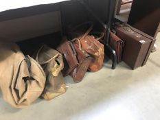 A quantity of vintage suitcases, briefcase & holdalls etc.