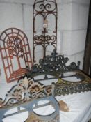 3 cast iron wall plant holders and 1 other