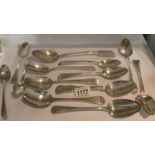 13 large silver spoons, approximately 700 grams.