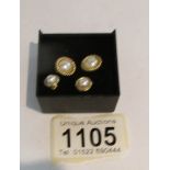 2 pairs of 9ct gold pearl set ear studs.