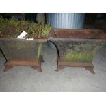A pair of Victorian cast iron planters