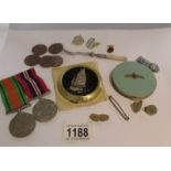 A mixed lot including medals, coins, powder compacts etc.