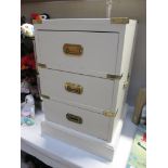 A lovely 3 drawer bedside cabinet in white with brass fittings