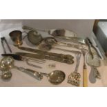 A mixed lot of silver plate cutlery including ladles etc.