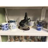 6 assorted blue and white loving cups a/f and a figure of a rearing horse