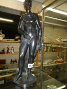 A large heavy bronze figure signed Epigny.