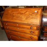 A mahogany bureau.