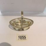 A small hall marked silver basket, approximately 70 grams.