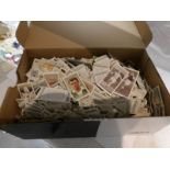 Approximately 2000 assorted loose cigarette cards including Wills, Players, Gallagher etc.