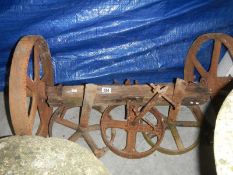 A quantity of cast iron wheels