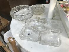 An hors d'oeuvres tray, a pair of knife rests, crystal glass,