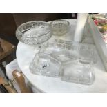An hors d'oeuvres tray, a pair of knife rests, crystal glass,