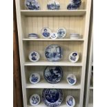 5 shelves of blue and white Delft plates etc.