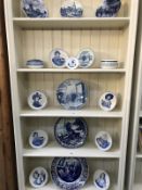 5 shelves of blue and white Delft plates etc.