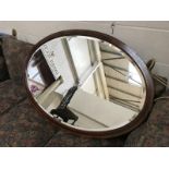 A large oval mirror