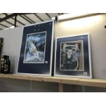 A framed and glazed print of a Terry Pratchett subject and a watercolour,
