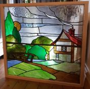 2 panel lead stained glass window in single frame depicting cottage & garden circa 1910,