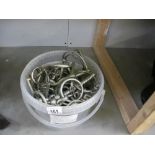A bucket of 20 old nickel horse bits
