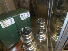 2 boxed 'Cathedral' candlesticks.