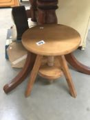 An adjustable stool